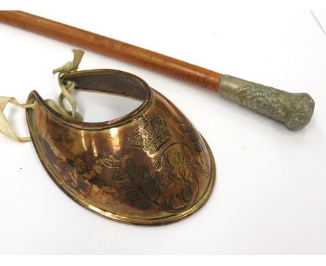 A Suffolk Regiment swagger stick with Kings Crown badge, together with a brass Gorget with engraved cypher and crown (2)