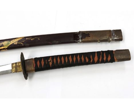 An Oriental samurai style sword with lacquered scabbard 