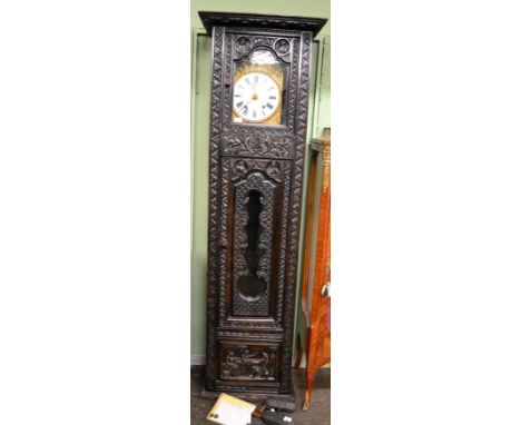 A carved striking longcase clock, enamel dial signed Lemonnier a Dinan, two eights, pendulum and key 