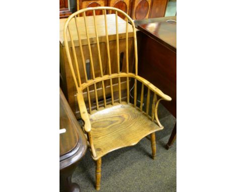 A 19th century ash and elm stick back armchair 