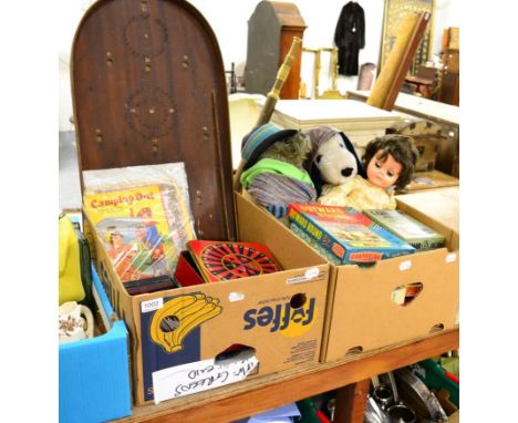 Two boxes of various games, puzzles and toys including a tin roulette game, playing cards, bagatelle board etc 