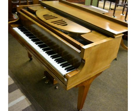 A Gors & Kallmann baby grand pianoCase faded on one side. In need of tuning. Highest key does not work. A few light scuffs to