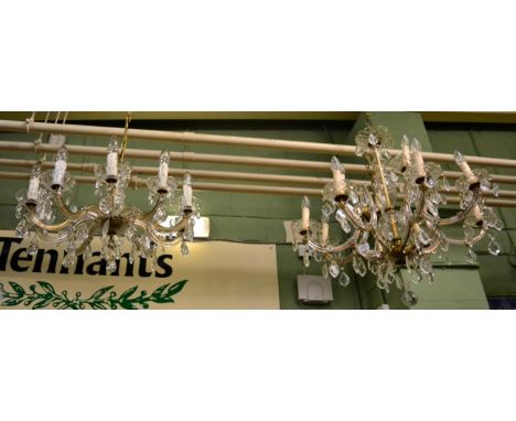 A Georgian style twelve light chandelier together with a similar ten light example (2)Right hand chandelier - one drop missin