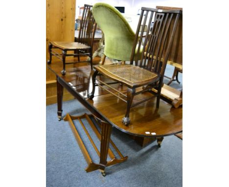 An Ercol plate rack and a pair of spar back occasional chairs with caned seats 