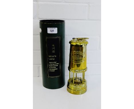 A brass miners lamp
