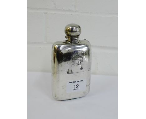 An Edwardian silver hip flask with makers mark for Goldsmiths and Silversmiths Company Ltd, London 1901, 13cm high 