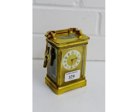 A brass carriage clock