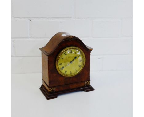 A Kendal & Dent burr wood cased mantle clock,  20cm high