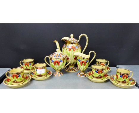 A Wedgwood floral lustre patterned pottery coffee set comprising coffee pot, cream jug, twin handled sugar bowl, six demitass