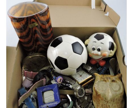 A quantity of ladies' and gentlemen's wristwatches, analog and digital; together with two football moneybox, a stoneware owl 