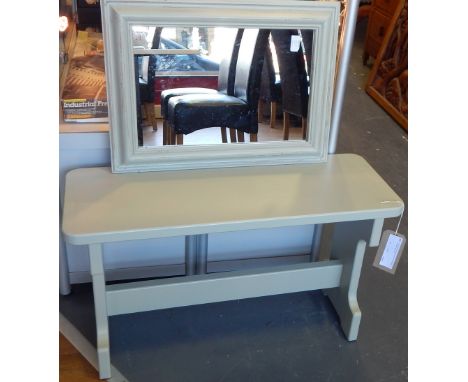 A Victorian style small painted bench seat and a rectangular wall mirror.