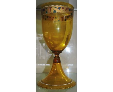 An early 20th Century amber glass goblet vase with gilded beaded band, H. 30cm.