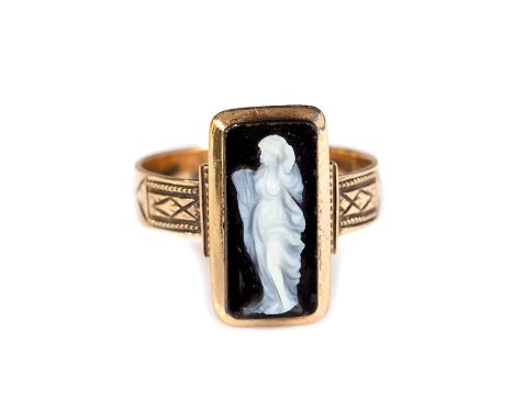 Early 19th century banded onyx cameo ring, the black and white carved rectangular cameo 16mm x 8mm, closed back, decorated sh