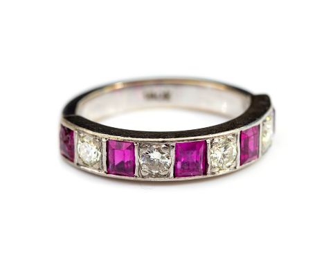 An 18ct white gold, diamond and rubies half eternity ring, alternately set with four round-brilliant cut diamonds total  weig