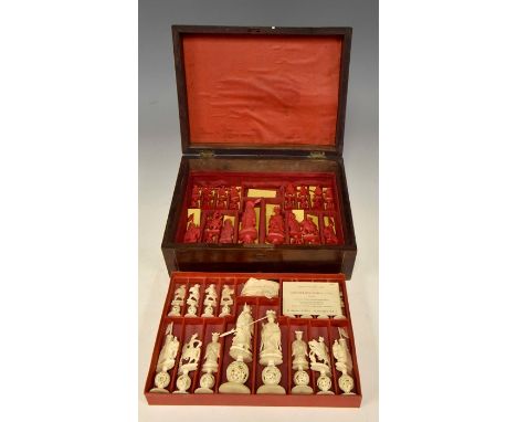 An early 20th Century Canton ivory chess set, comprising thirty two pieces in the natural and stained red, each playing piece