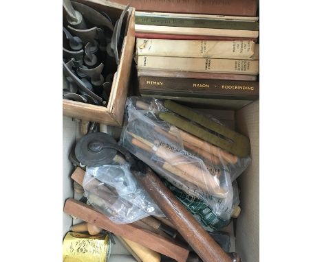 Collection of vintage book binding tools, together with a small quantity of books on the subject