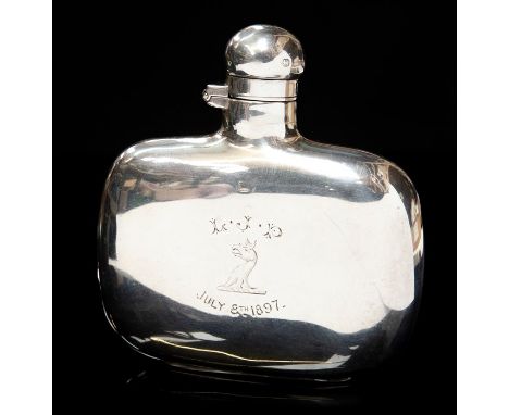 A Victorian silver plain oblong silver hip flask, the front engraved with a crest beneath initials and date: July 8th 1897, J