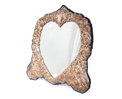 A large Victorian style silver mounted easel style dressing table mirror,&nbsp;having bevelled heart shaped mirror within sha