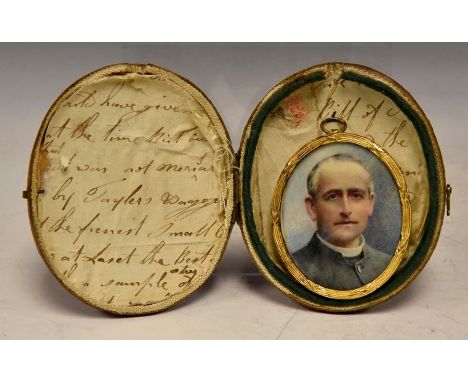 An Edwardian oval portrait miniature of a Clergyman, on ivory, gilt frame, 5.5cm by 4.5cm