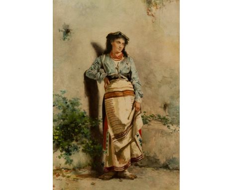 Guerrino Guardabassi (Italian, 1841-1893), portrait of an Italian country girl, standing full length beside a wall, signed an