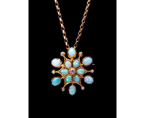 A late Victorian/Edwardian opal and diamond star pendant/brooch, set with a central round old-cut diamond, surrounded by twel