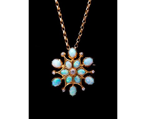 A late Victorian/Edwardian opal and diamond star pendant/brooch, set with a central round old-cut diamond, surrounded by twel