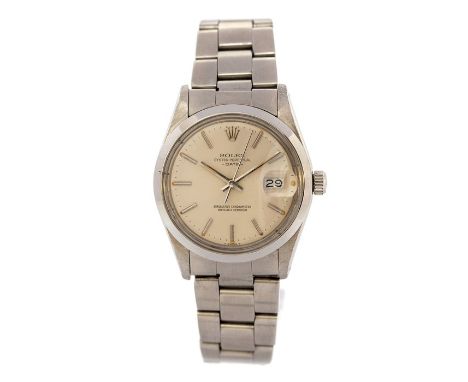 Rolex, a 1980's steel Rolex Oyster Perpetual Date wristwatch, 3cm circular champagne dial, baton hands and numerals, date ape