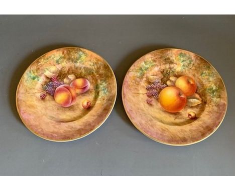 Two Royal Worcester small plates, painted with fruit, both signed  P. English, 20th Century, black mark England, 16cm diamete