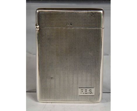 ***AWAY VENDOR COLLECTED 09/04***A George V silver engine turned card case, engraved with initials F.E.S, Deakin &amp; Franci