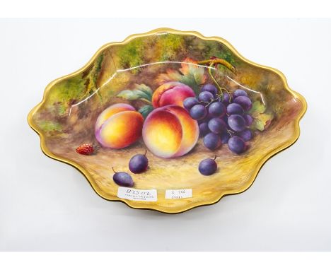 A Royal Worcester pedestal dish ,depicting fallen fruit painted by Thomas Lockyer,in 1935, L. 29cms, W. 21.5cms, H. 7cms, ped