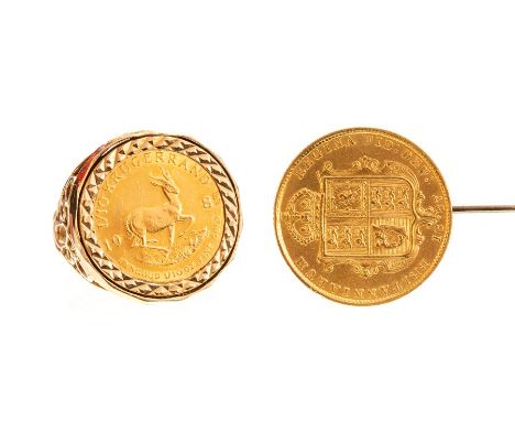 A 1/10 Krugerrand signet ring, 9ct gold setting and shank, approx 6.1gms; a Victorian half sovereign set stick pin, coin date