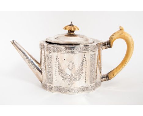 A Victorian Neo-Classical silver oval teapot, bright-cut decoration,&nbsp; ivory scroll handle and carved ivory finial. Andre