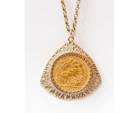 A 1911 sovereign, with 9ct gold surround and chain, approx 17.5gms gross