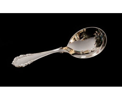 Georg Jensen: A rose pattern caddy spoon, stamped with sterling silver London import mark dated 1935, 0.75 ozt (0.75 grams)CO