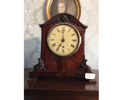 A Victorian mahogany cased bracket clock, with white dial and black Roman numerals having a spring driven movement. Complete 