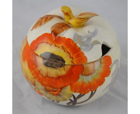 Clarice Cliff for Wilkinson, a Rhodanthe apple shaped preserve pot, Bizarre mark, 8cm highCONDITION:Spot staining to lid and 