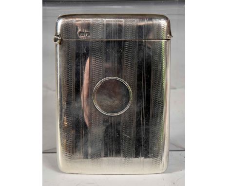 A George V silver engine turned card case,&nbsp;with vacant circular cartouche, Joseph Gloster Ltd,&nbsp;Birmingham, 1918, 2.