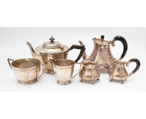 A George VI silver English plain silver tea service comprising teapot, milk jug and sugar bowl, F H Adams & Co  Birmingham, 1