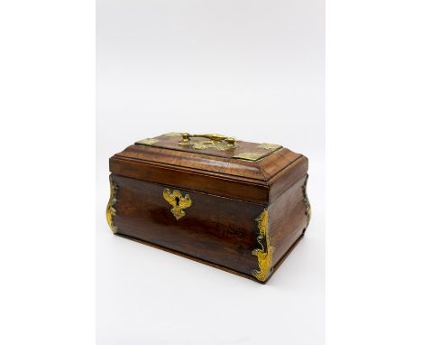 An 18thC tea caddy, brass mounted.