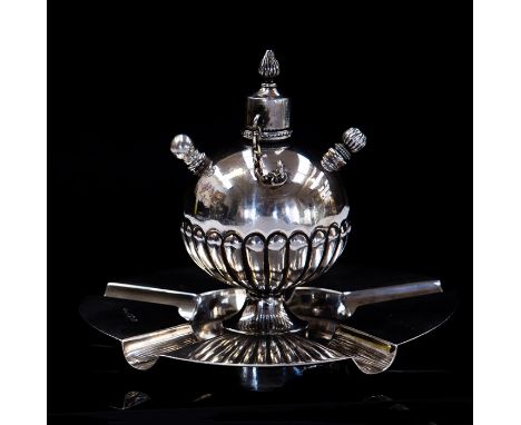 An Edwardian silver combination ashtray and cigar lighter, globe body with detachable spikes, James Dixon &amp; Sons, Sheffie