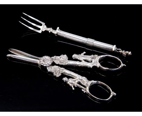 A George III silver retractable travelling fork, apparently unmarked together with a pair of George V silver grape scissors, 