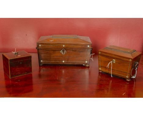 A sarcophagus shaped tea caddy with mother of pearl inlays. Interior has 2 tea compartments and a central bowl area  Bowl not