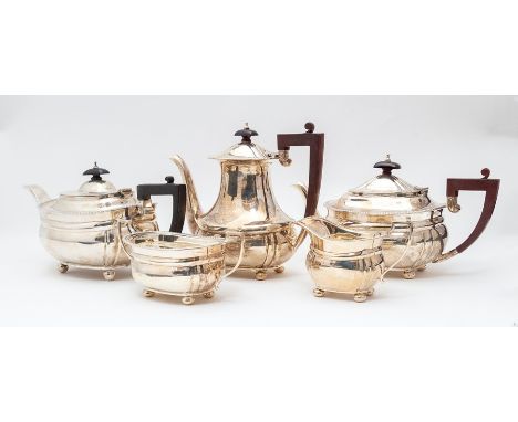 An Elizabeth II silver four piece tea and coffee service,&nbsp;comprising teapot, coffee pot, milk jug and sugar bowl, Elking