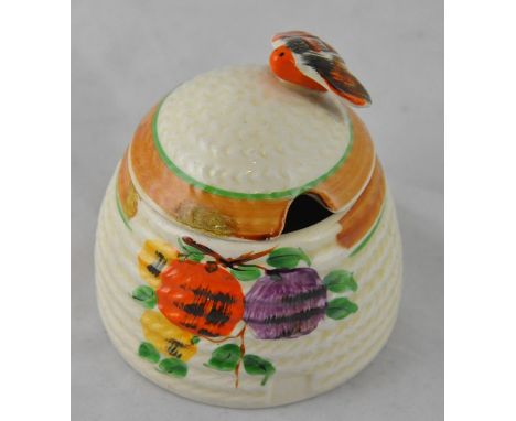  Clarice Cliff for Wilkinson, a small beehive honey pot, fruit design, Honeyglaze mark, 7.5cm highCONDITION:Lid chipped, body