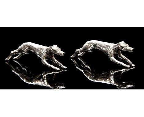 A&nbsp;pair of Art Deco electroplated novelty knife rests modelled as racing greyhounds, each wearing vests numbered 1 (2)