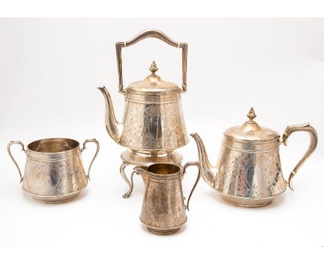 A Victorian Aesthetic silver four piece service including tea kettle and stand, teapot, sugar bowl and milk, the bodies profu