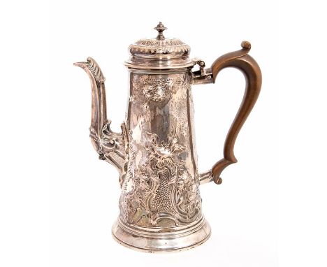 A George II silver coffee pot, the body later chased with flowers and foliage, the spout with acanthus terminal, S-scroll han