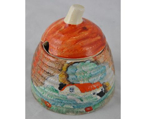 Clarice Cliff for Wilkinson, a Forest Glen beehive honey pot, Linton lid, Bizarre marks, 8cm high