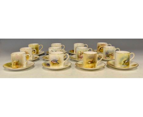 A set of twelve Royal Worcester coffee cans and saucers,&nbsp;painted with ornithology, the cans depicting Teal, Wild Duck, M