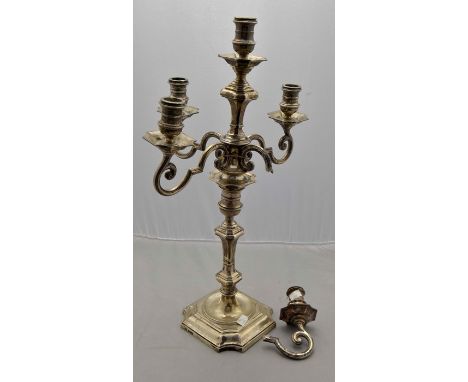 A George V large five-light candelabra, detachable central stem with one branch broken but present, above baluster stem, Garr